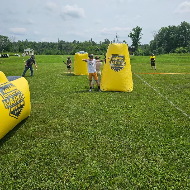 Archery tag group in field